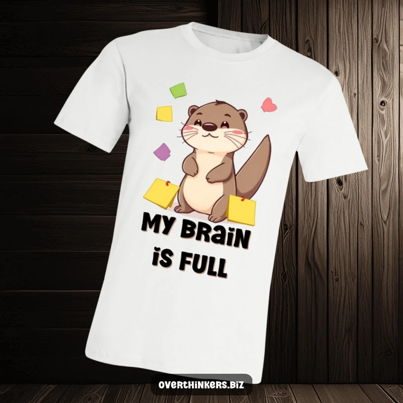 Funny Otter Sticky Note Juggling T-Shirt: A whimsical otter skillfully juggles sticky notes with its tail, a fun design.